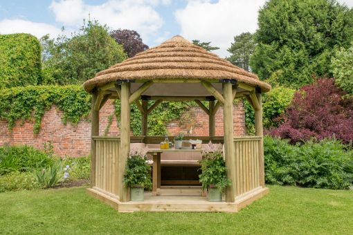 Picture of 3.6m Hexagonal Wooden Garden Gazebo with Thatched Roof - Furnished with Table, Benches and Cushions (Cream)