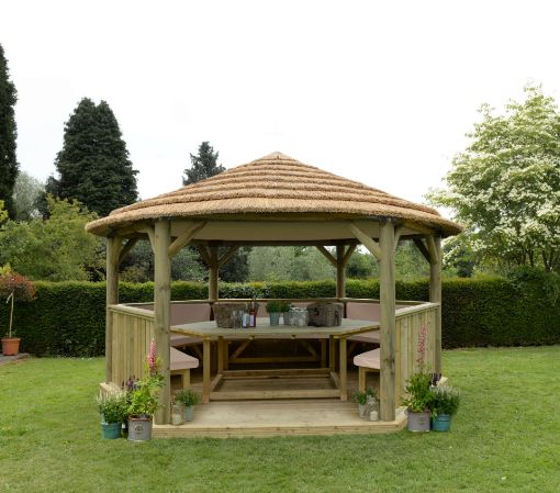 Picture of 4.7m Hexagonal Wooden Garden Gazebo with Thatched Roof - Furnished with Table, Benches and Cushions (Cream)